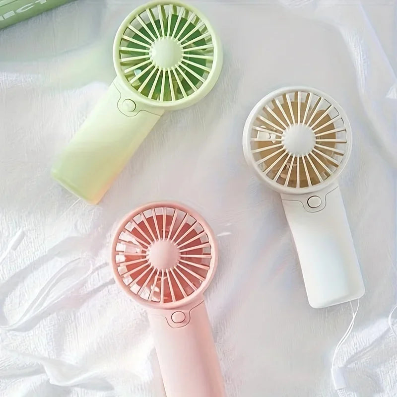Mini Ventilateur Portable:  Léger, Silencieux & Rechargeable – Format de Poche