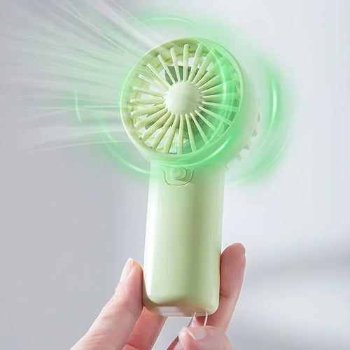 Mini Ventilateur Portable:  Léger, Silencieux & Rechargeable – Format de Poche