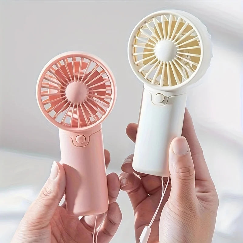 Mini Ventilateur Portable:  Léger, Silencieux & Rechargeable – Format de Poche