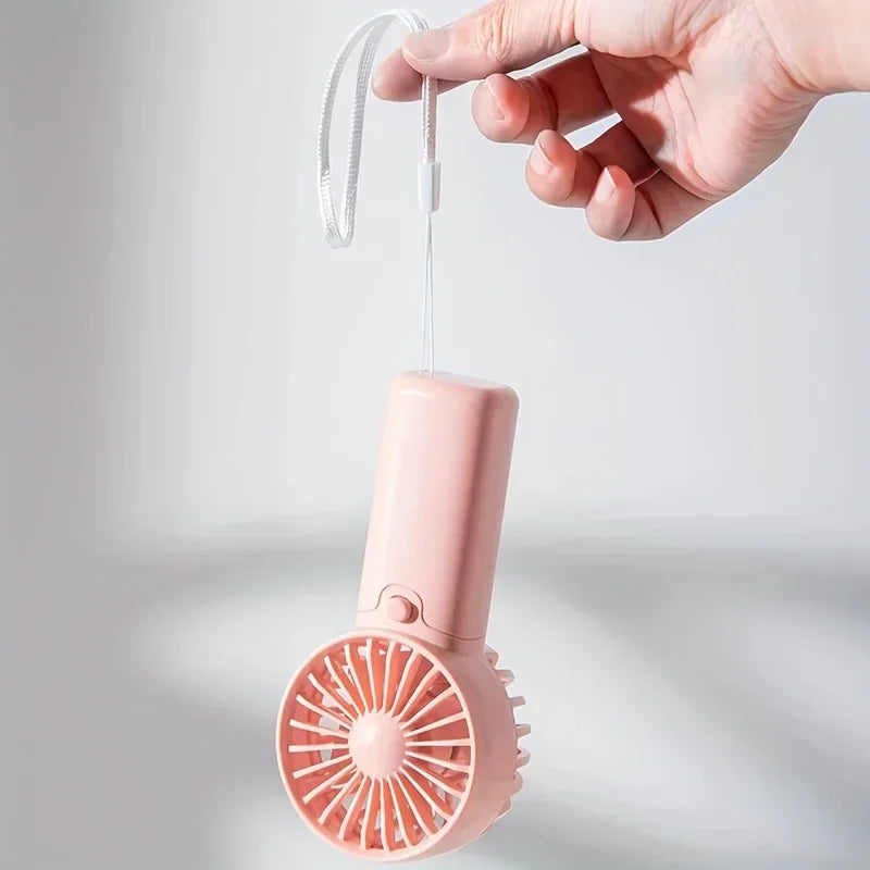 Mini Ventilateur Portable:  Léger, Silencieux & Rechargeable – Format de Poche