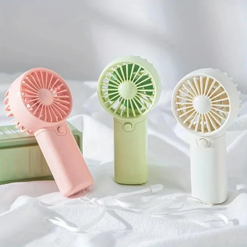Mini Ventilateur Portable:  Léger, Silencieux & Rechargeable – Format de Poche