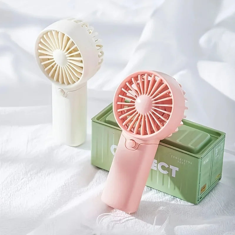 Mini Ventilateur Portable:  Léger, Silencieux & Rechargeable – Format de Poche