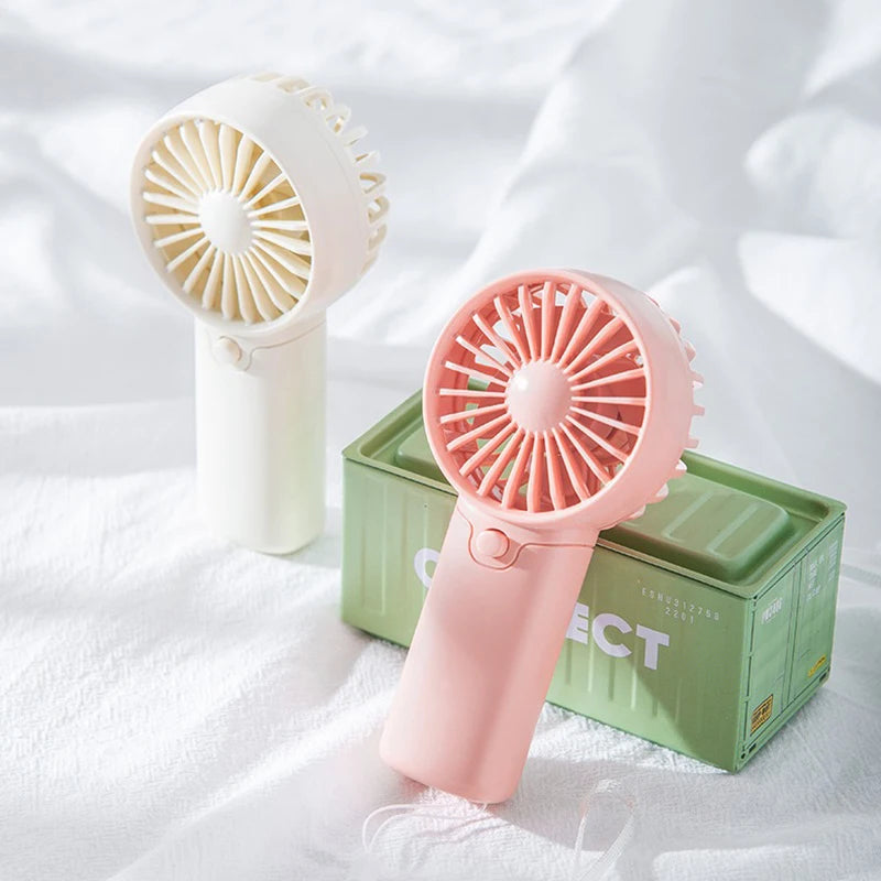Mini Ventilateur Portable:  Léger, Silencieux & Rechargeable – Format de Poche